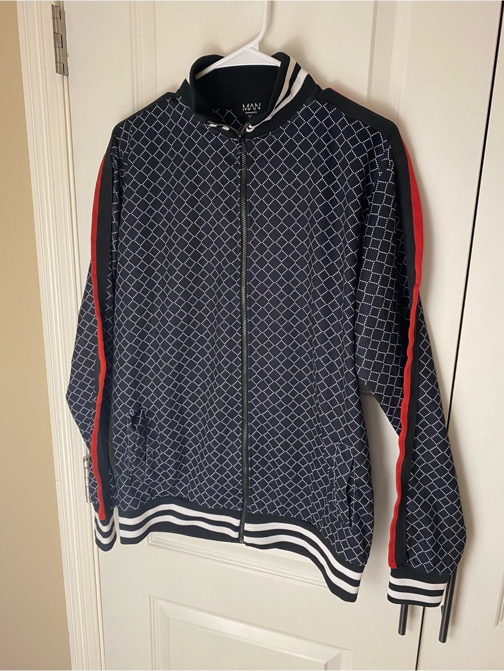 Men's Black Geo-Pattern Tracksuit Jacket with Red Sleeve Stripe